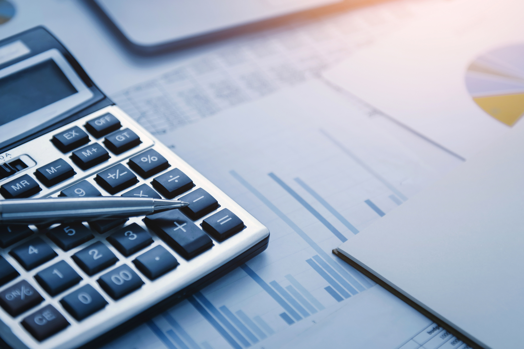 calculator and investment documents